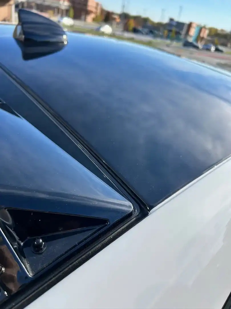 This custom vehicle project showcases a sleek design with a vibrant color change wrap, expertly crafted by Layrite Customs in Liberty, MO.
