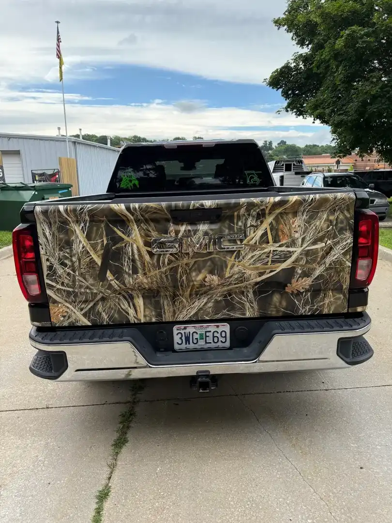 This striking custom vehicle project showcases expert automotive customization with a sleek color change wrap, highlighting Layrite Customs' craftsmanship in Liberty, MO.