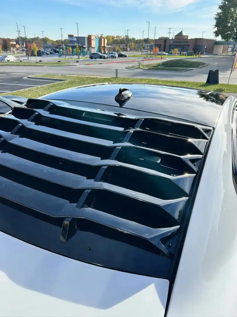 This striking custom vehicle project features a sleek design enhanced by a professional ceramic coating, showcasing Layrite Customs' expertise in automotive customization.