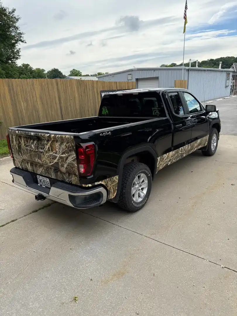 This custom vehicle project showcases a sleek automotive customization with a stunning color change wrap, expertly crafted to enhance its visual appeal.