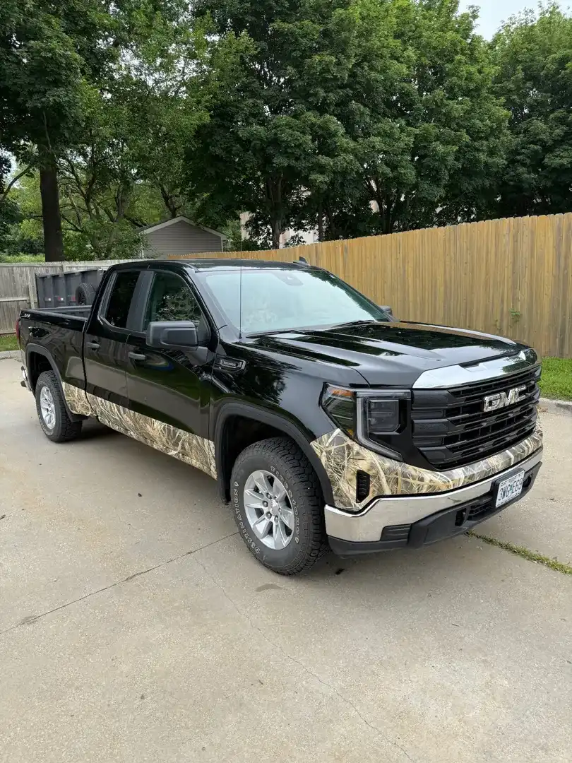 This striking custom vehicle project showcases a sleek design enhanced by a premium ceramic coating, expertly crafted by Layrite Customs in Liberty, MO.