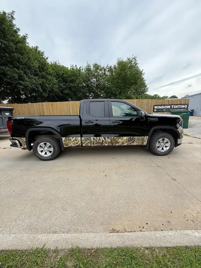 This striking custom vehicle project showcases a sleek, modern design with premium window tinting, expertly crafted at Layrite Customs in Liberty, MO.