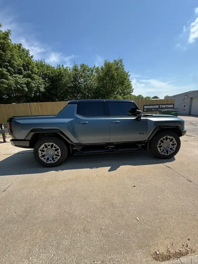 This striking custom vehicle project showcases a stunning color change wrap, expertly applied by Layrite Customs in Liberty, MO, highlighting our automotive customization skills.