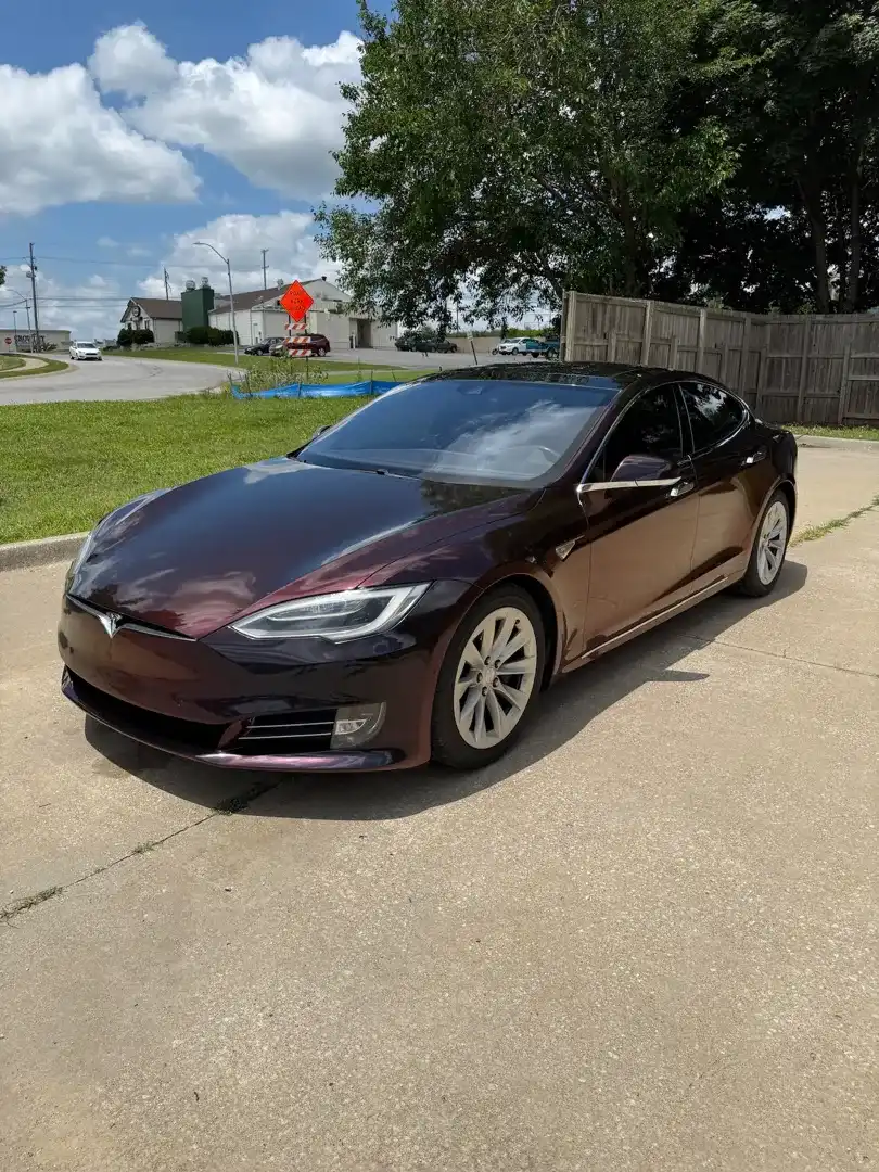 This striking custom vehicle project showcases a sleek color change wrap, expertly crafted at Layrite Customs, enhancing its appeal in Liberty, MO.