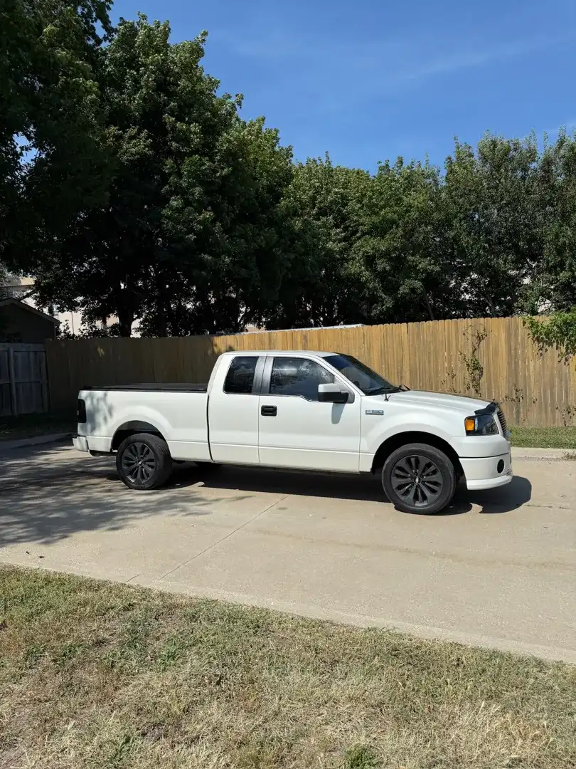 This custom vehicle project showcases a sleek design enhanced by a professional ceramic coating, expertly crafted by Layrite Customs in Liberty, MO.