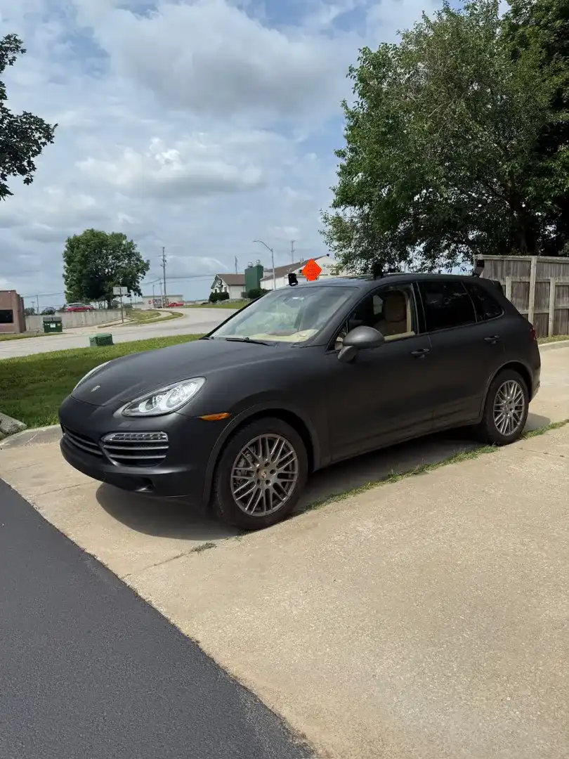 This custom vehicle project showcases a sleek design enhanced by a fresh ceramic coating, highlighting the exceptional automotive craftsmanship at Layrite Customs in Liberty, MO.