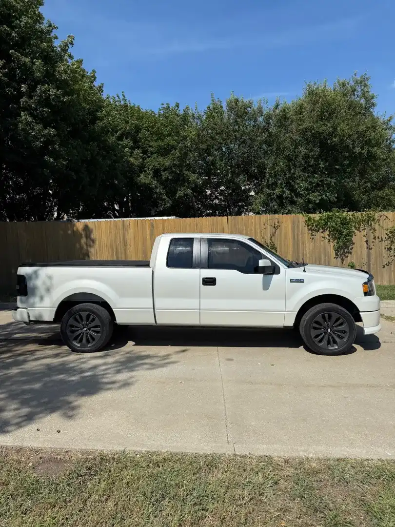 This striking custom vehicle project features a sleek design and premium ceramic coating, showcasing the expert automotive customization services available at Layrite Customs in Liberty, MO.