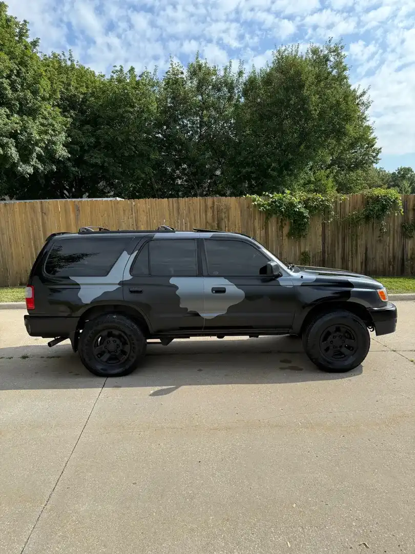 This stunning custom vehicle project showcases a vibrant color change wrap that enhances its sleek design, expertly crafted by Layrite Customs in Liberty, MO.