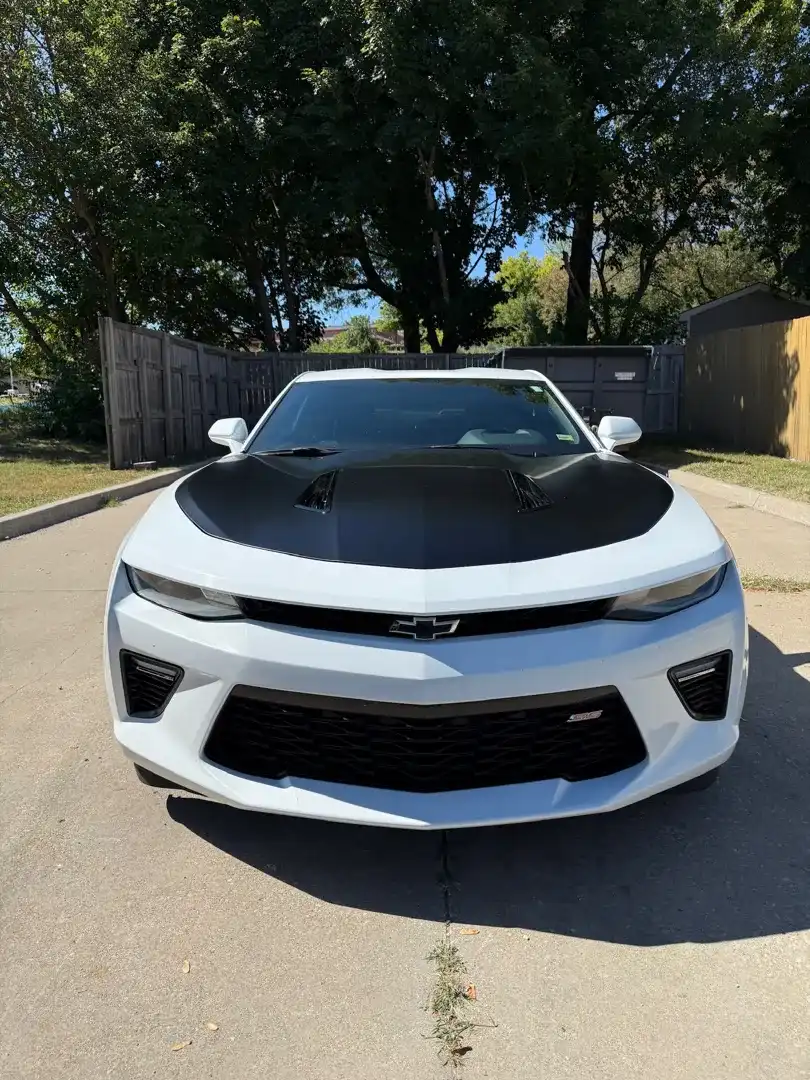This striking custom vehicle project showcases a vibrant color change wrap, expertly applied by Layrite Customs in Liberty, MO, demonstrating high-quality automotive customization.