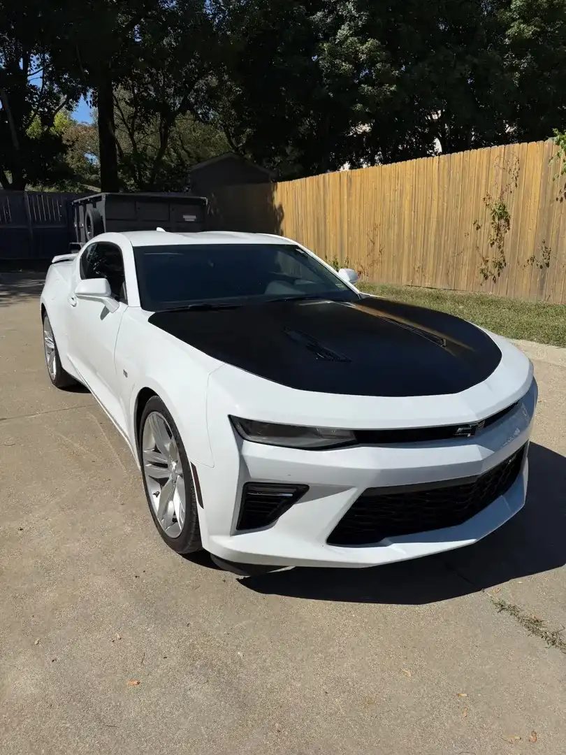 This custom vehicle project showcases a sleek design enhanced by a professional ceramic coating, highlighting the quality of automotive customization by Layrite Customs in Liberty, MO.