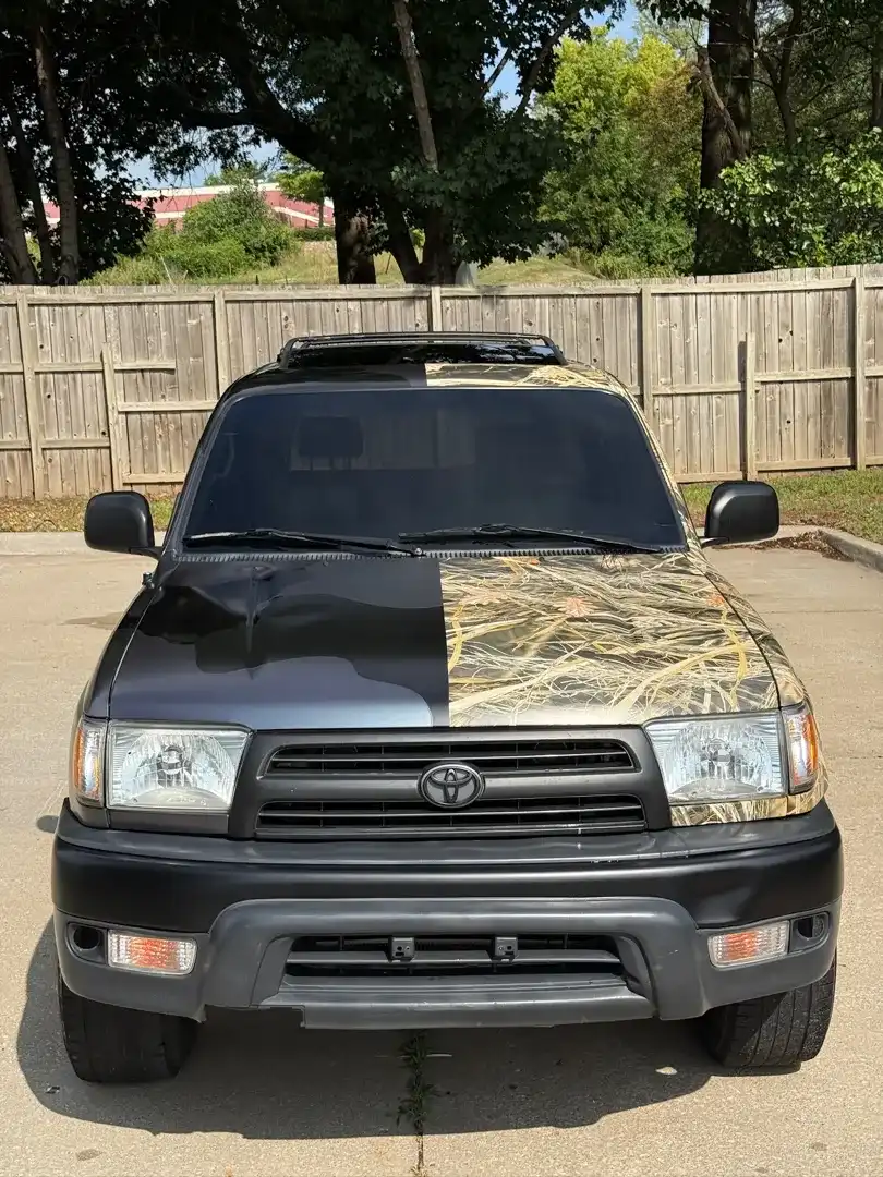 This striking custom vehicle project features a sleek design enhanced with a professional ceramic coating, showcasing Layrite Customs' quality craftsmanship in Liberty, MO.
