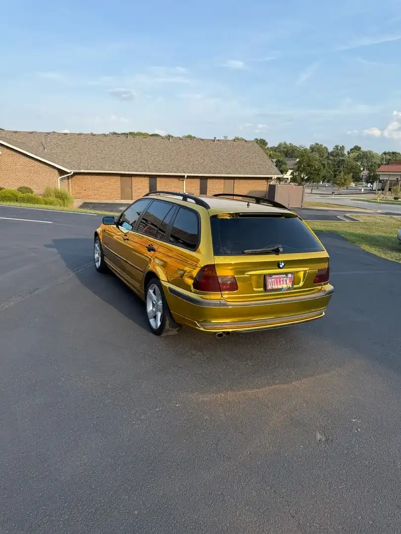 This striking custom vehicle project showcases a vibrant color change wrap, expertly applied at Layrite Customs in Liberty, MO, enhancing its unique style.