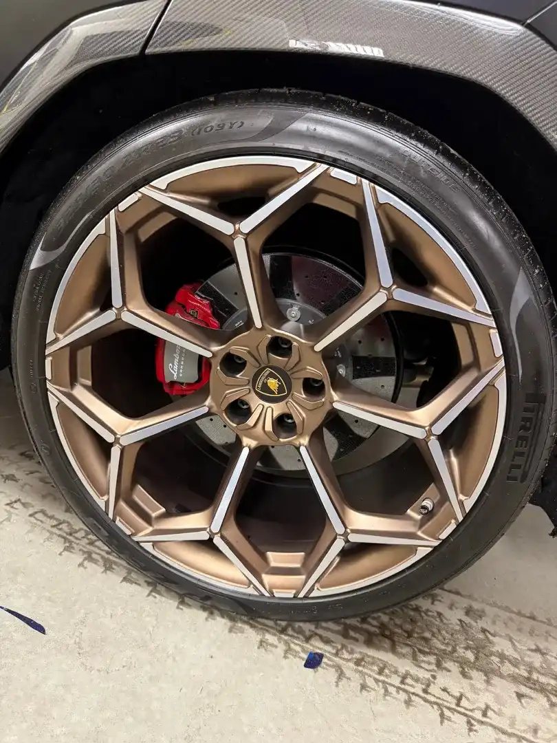 This custom vehicle project showcases a vibrant color change wrap, demonstrating the high-quality automotive customization services available at Layrite Customs in Liberty, MO.