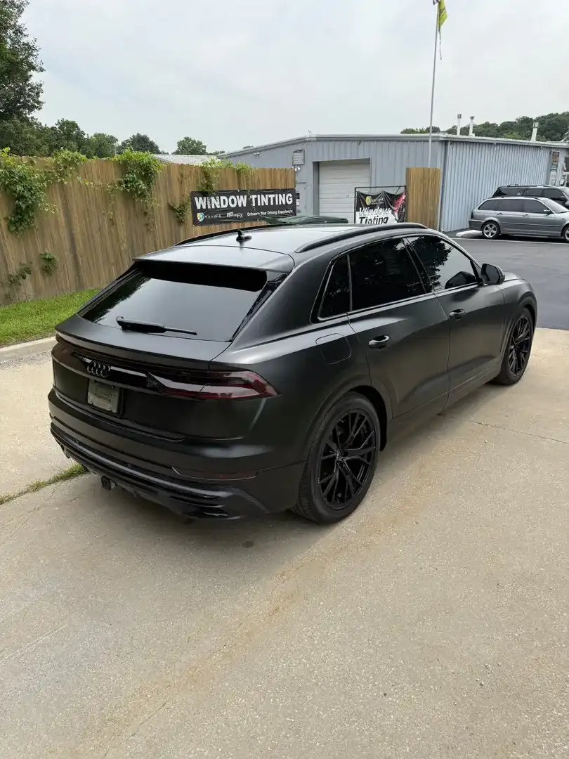 This striking custom vehicle project showcases a sleek design enhanced by a professional ceramic coating, expertly applied at Layrite Customs in Liberty, MO.