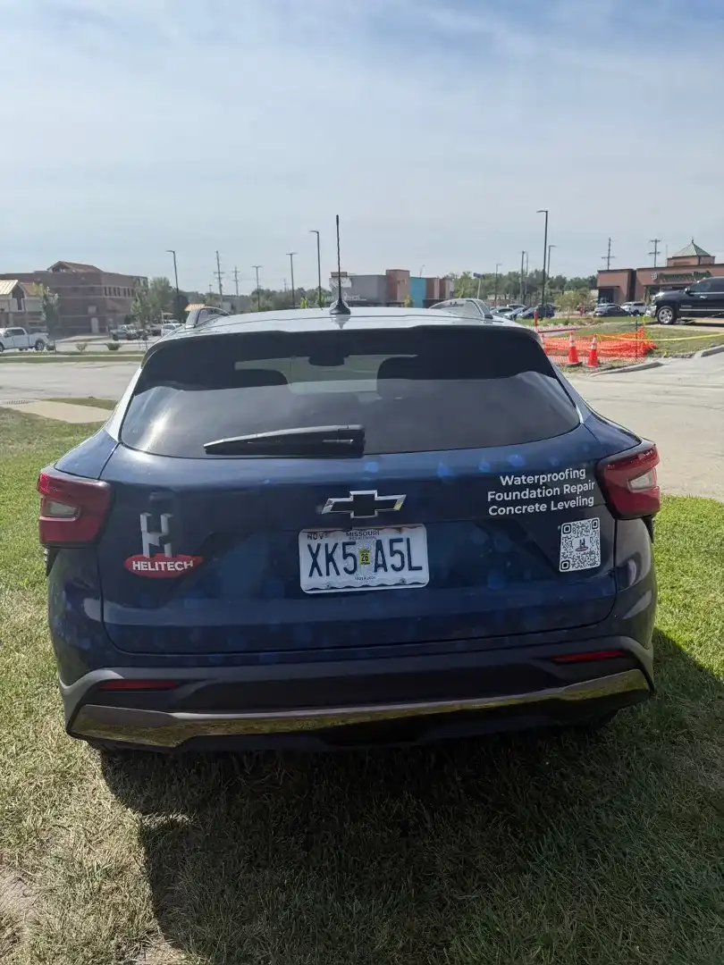 This striking custom vehicle project showcases a dynamic automotive customization with a sleek design, expertly detailed for an impressive look in Liberty, MO.