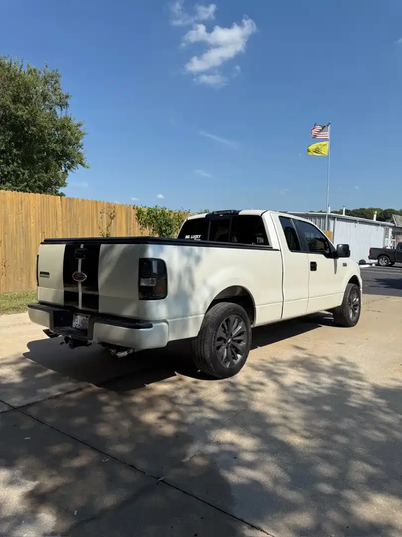 This custom vehicle project showcases a stunning automotive customization with a sleek color change wrap, expertly crafted at Layrite Customs in Liberty, MO.