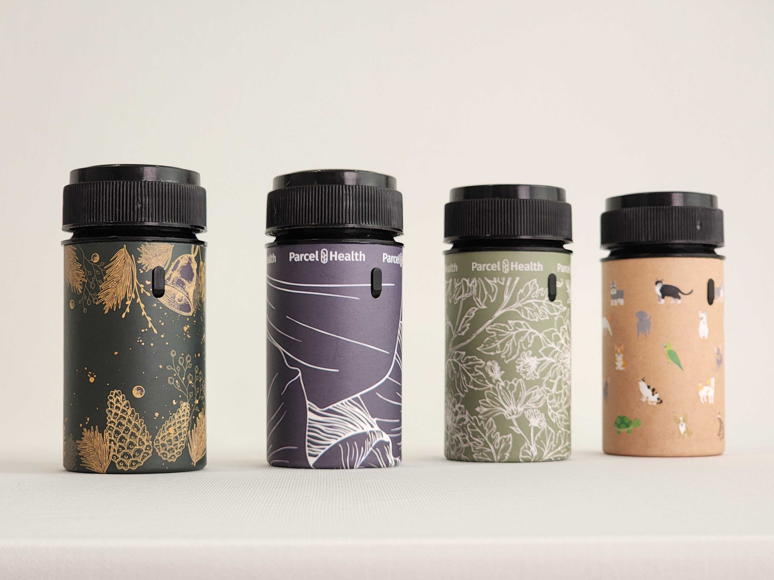 Winter Pine, Beautiful Blue, Going Green and Pet Print Designs of Parcel Health Tully Tubes