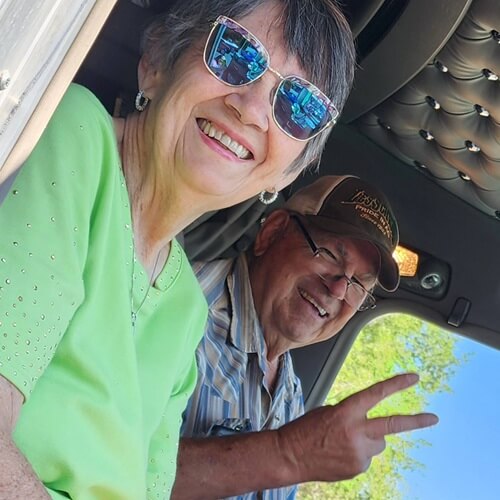 WHH truck driver and wife in cab
