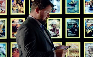 Man looking at his mobile phone.