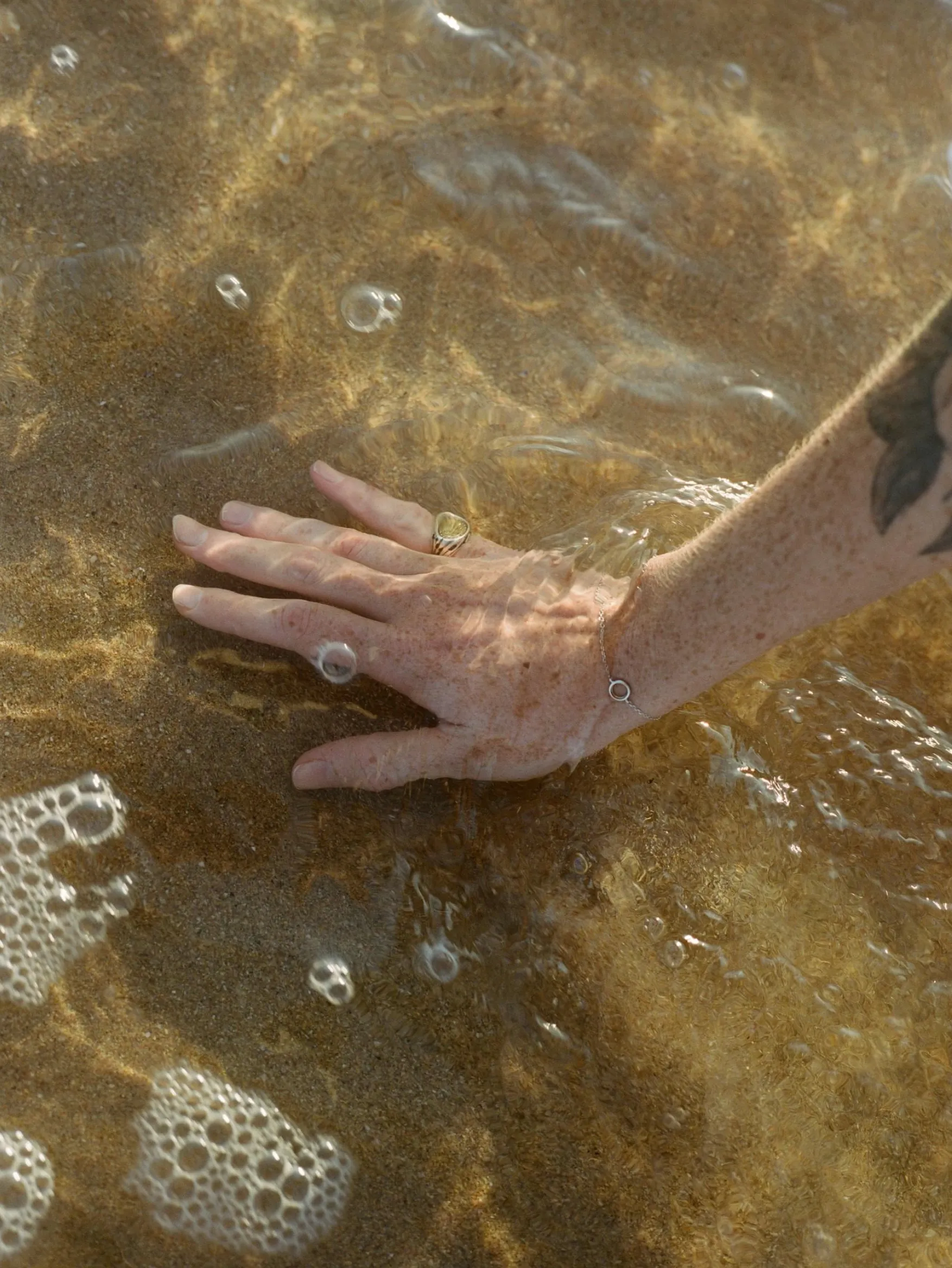 hand in water mindful connection