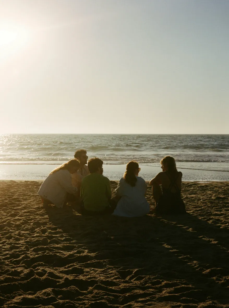 group reflection sunset beach circle