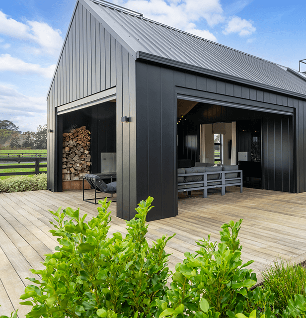House in a farm estate, bushes infront open plan living