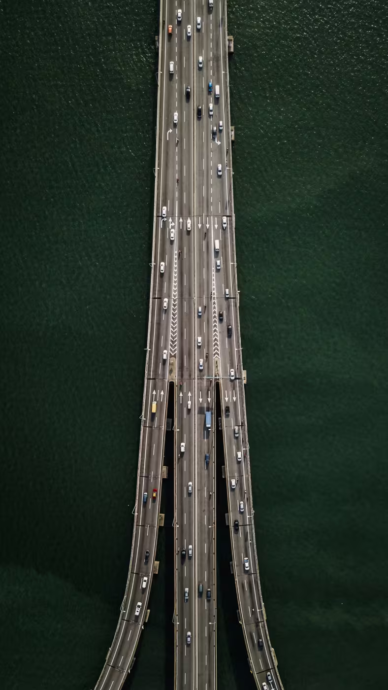 Aerial view of Penang Bridge with cars crossing