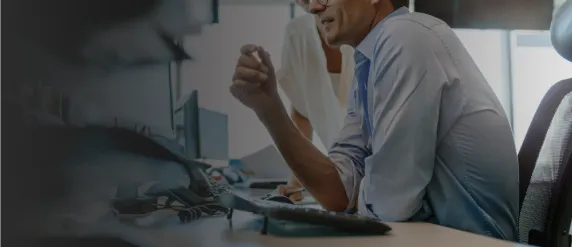 Professional reviewing critical project data on screen