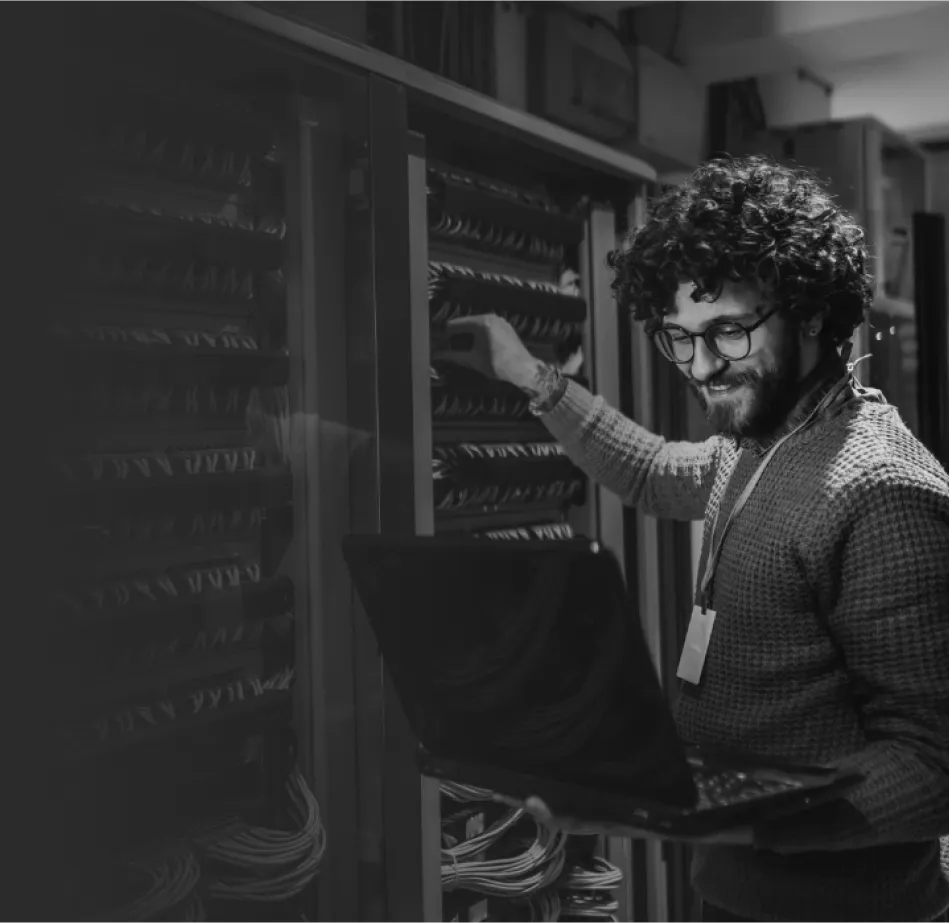 Engineer managing servers in a high-security facility