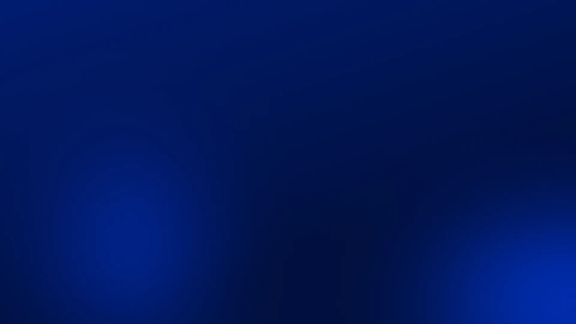Abstract dark blue background with subtle gradients and soft light spots.