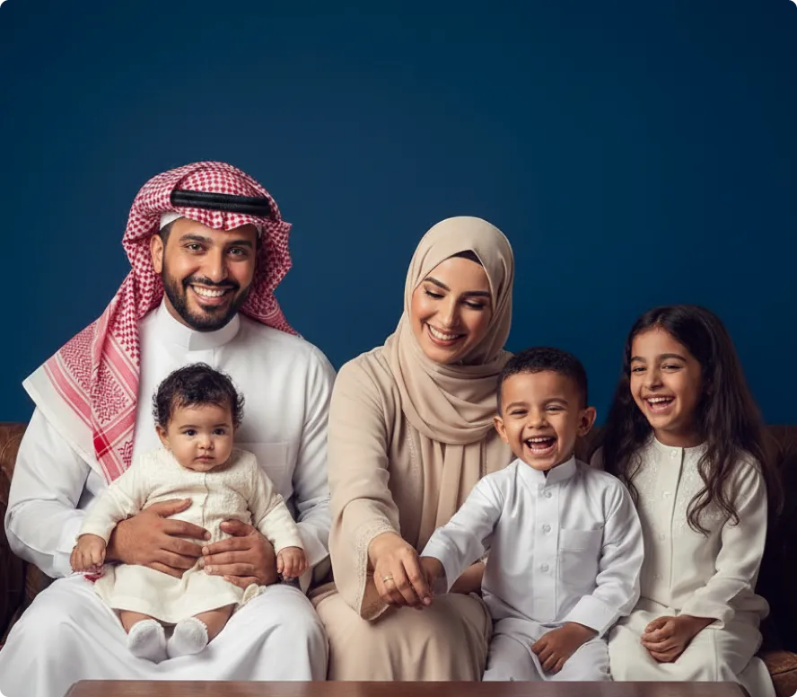 Smiling Middle Eastern family of five sitting together; father holding baby, mother holding young boy's hand, and girl sitting beside them.