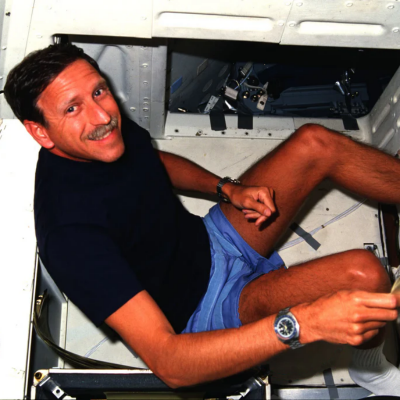 Richard O. Covey using a Seiko watch in space