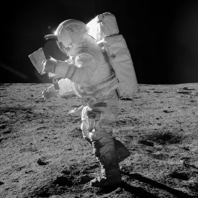 Edgar Mitchell using a Omega watch in space