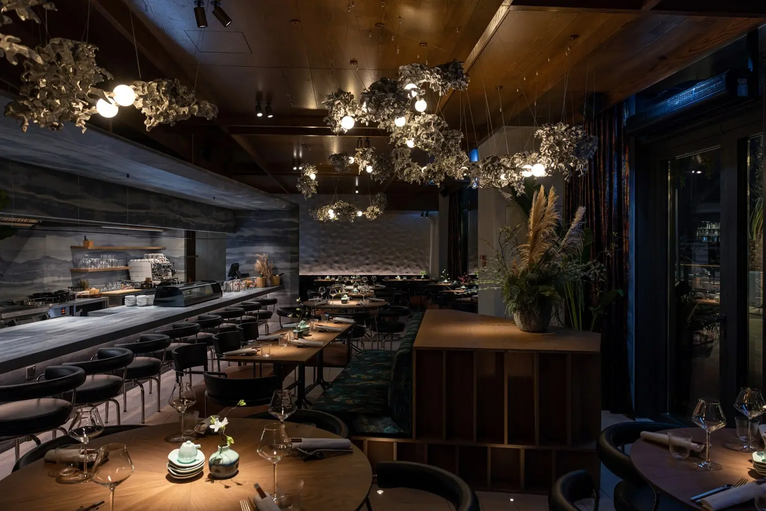 Interior photo of the restaurant, facing the bar