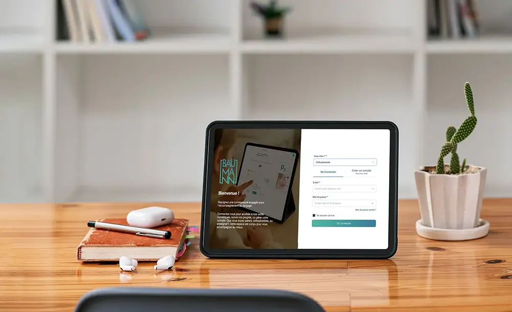 Une tablette numérique montrant la page d accueil du logiciel Baumann