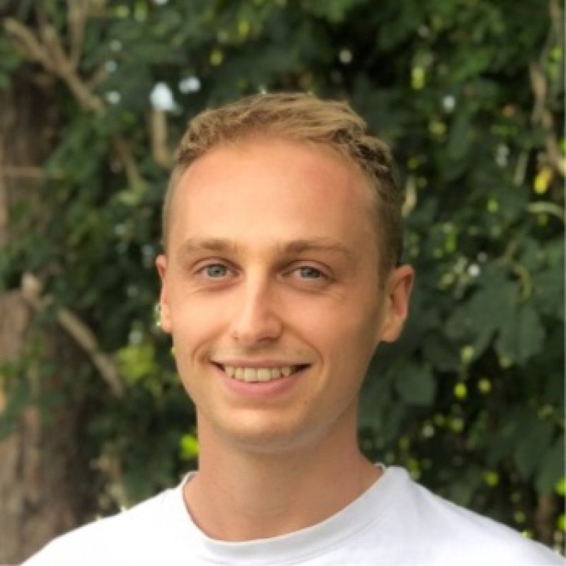 customer giving a testimonial for an ai biotech company [headshot]