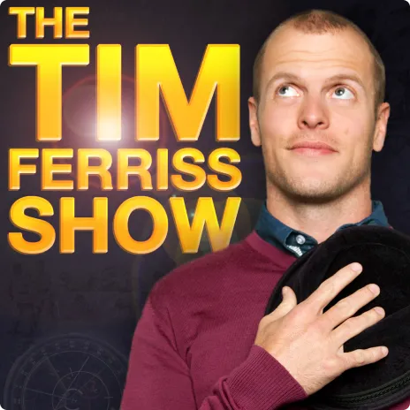 Tim Ferriss looking up while holding a black hat, with the text 'THE TIM FERRISS SHOW' in large yellow letters on the left.