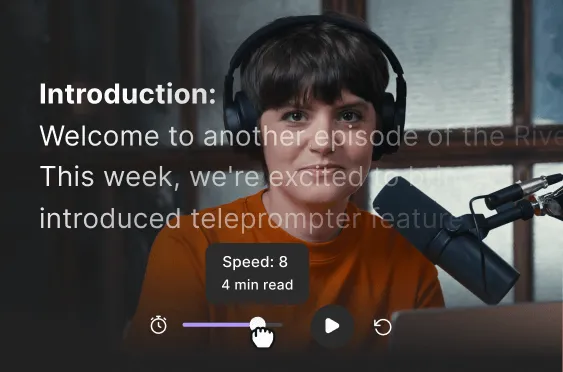 Person with short dark hair wearing headphones and an orange shirt speaking into a microphone in a recording studio, with an overlaid teleprompter text and playback controls visible.