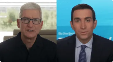 Side-by-side video call showing two men; the left man with gray hair and glasses, the right man with dark hair and a suit.