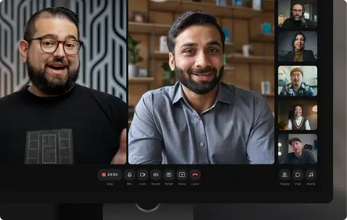 Video conference screen showing two large active speakers and five smaller participant windows with controls below.