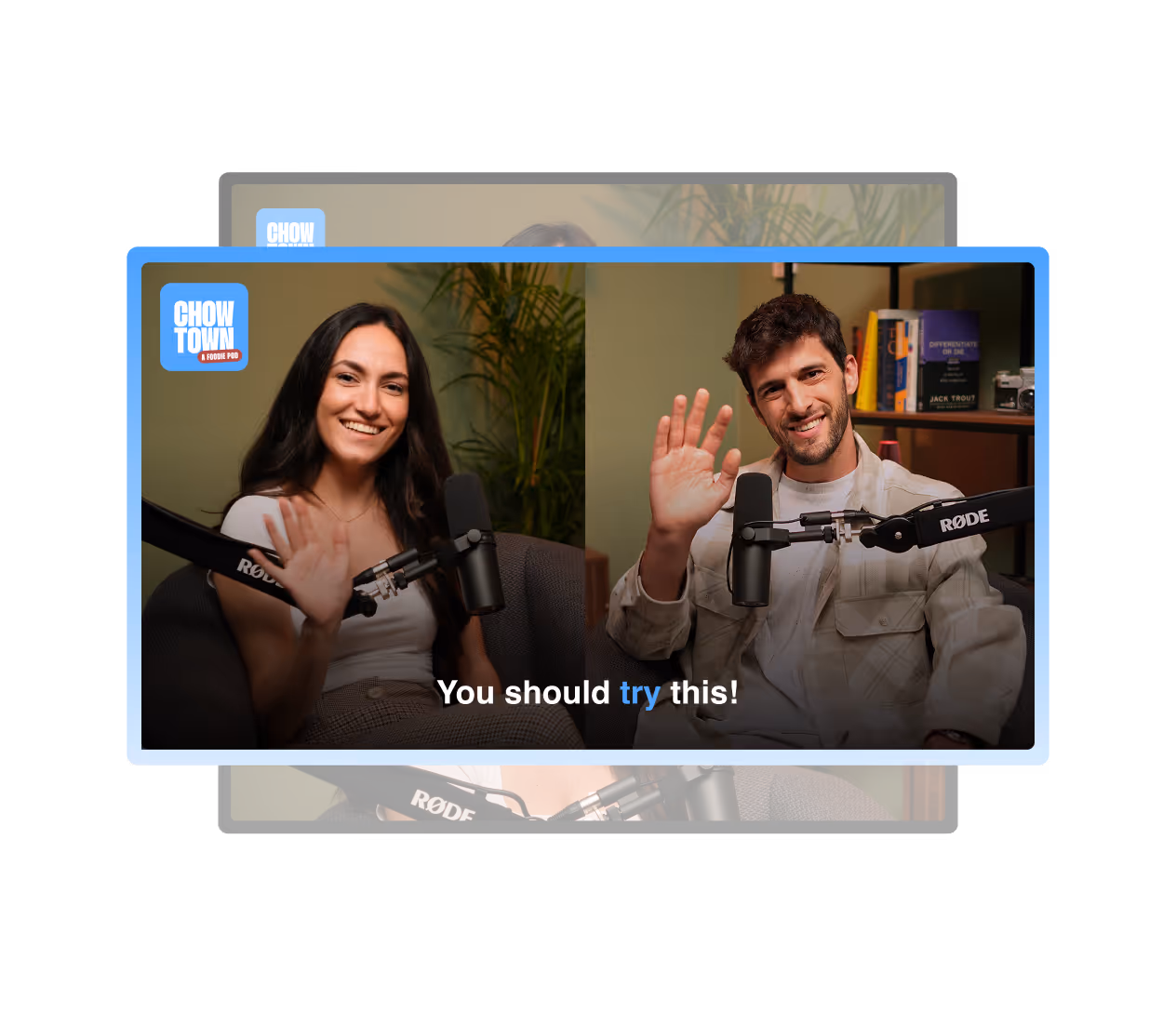 Smiling man and woman waving during a podcast recording