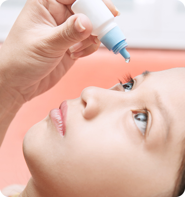 girl with eyedrops