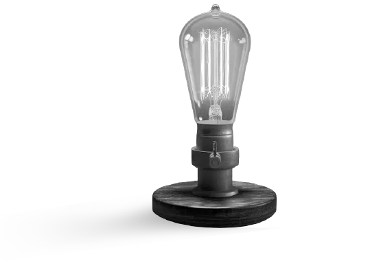 Vintage Edison-style light bulb on a round wooden base with industrial metal fixture.