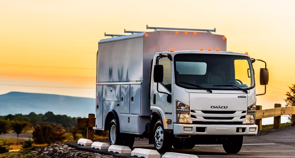 Isuzu box truck parked