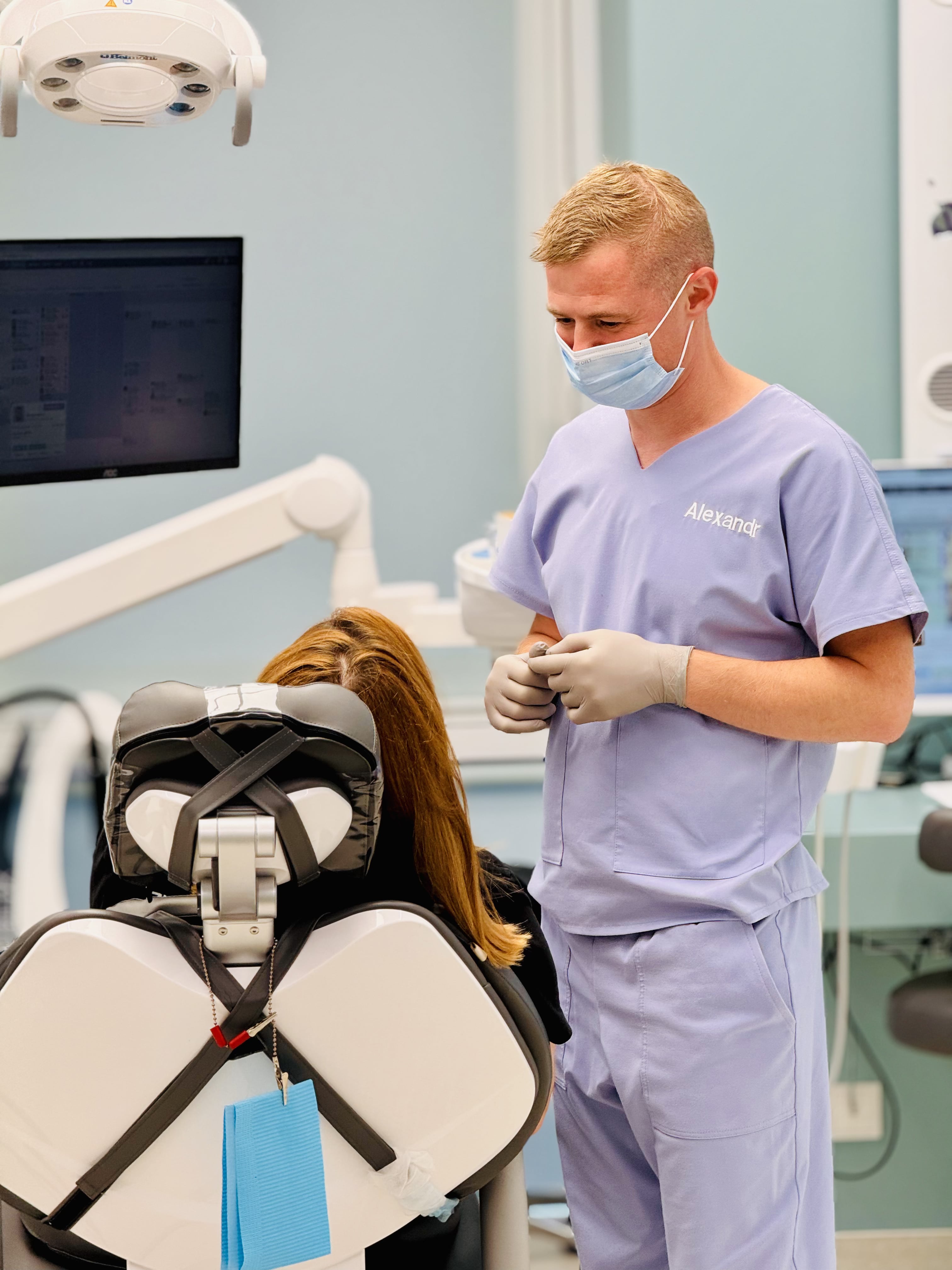A medical scene showing a doctor taking blood pressure.