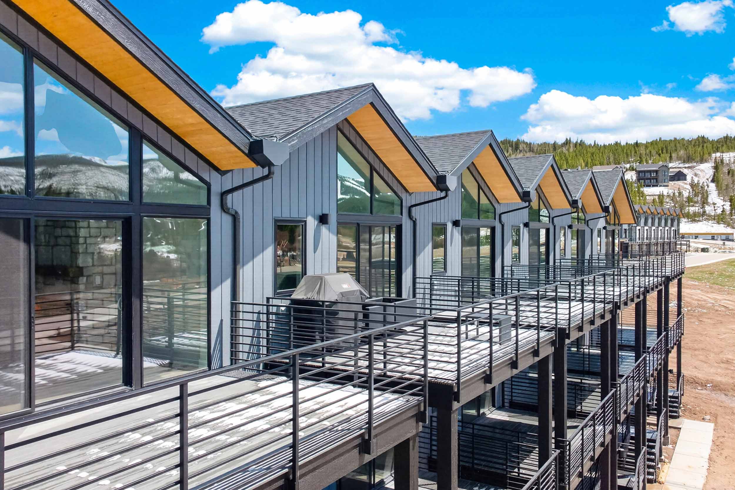 Outdoor balcony with blue sky and mountain view at 113 Wheeler Road in Winter Park, Colorado.