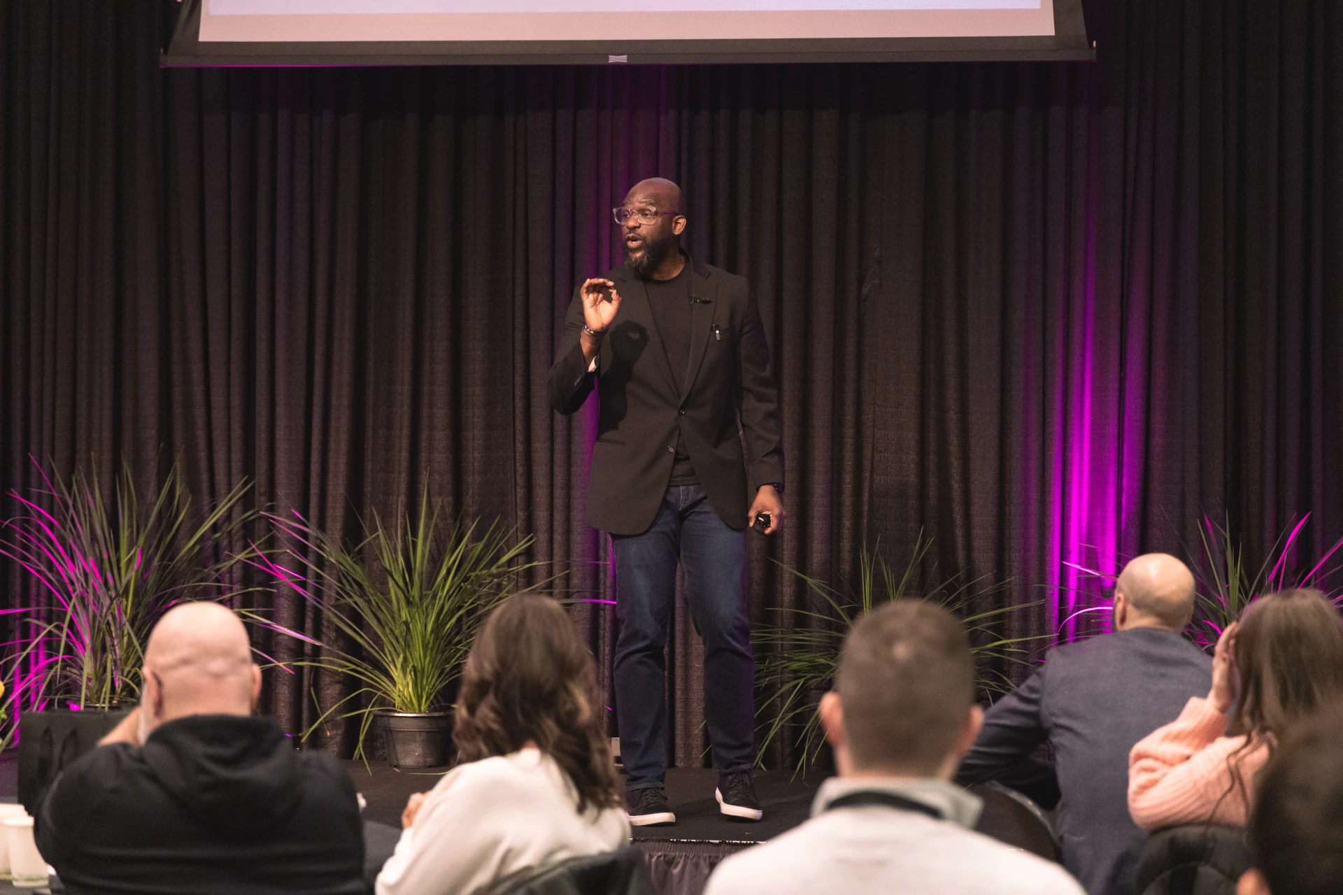 dan owolabi speaking on stage at blaze expo