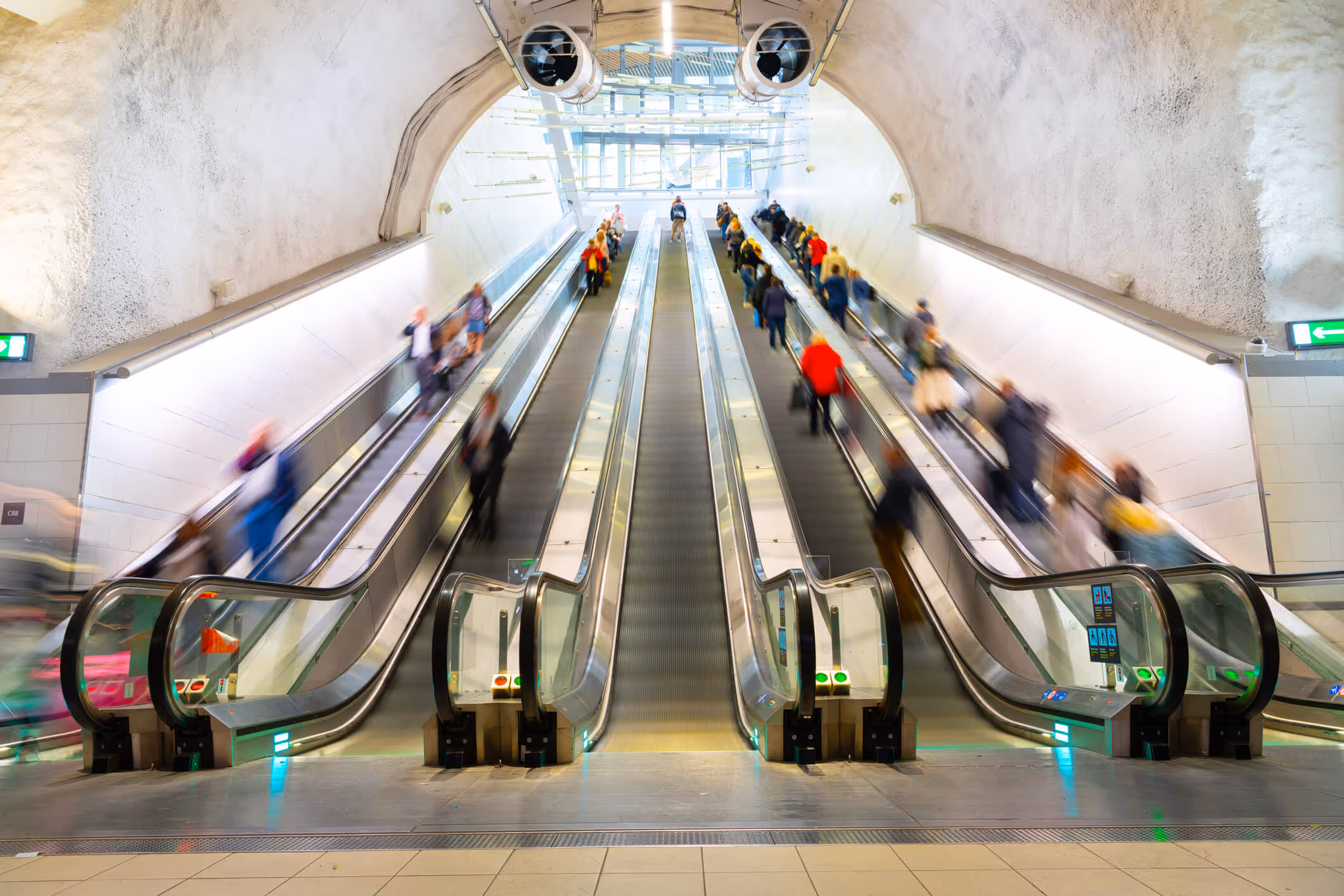 City escalator full of people