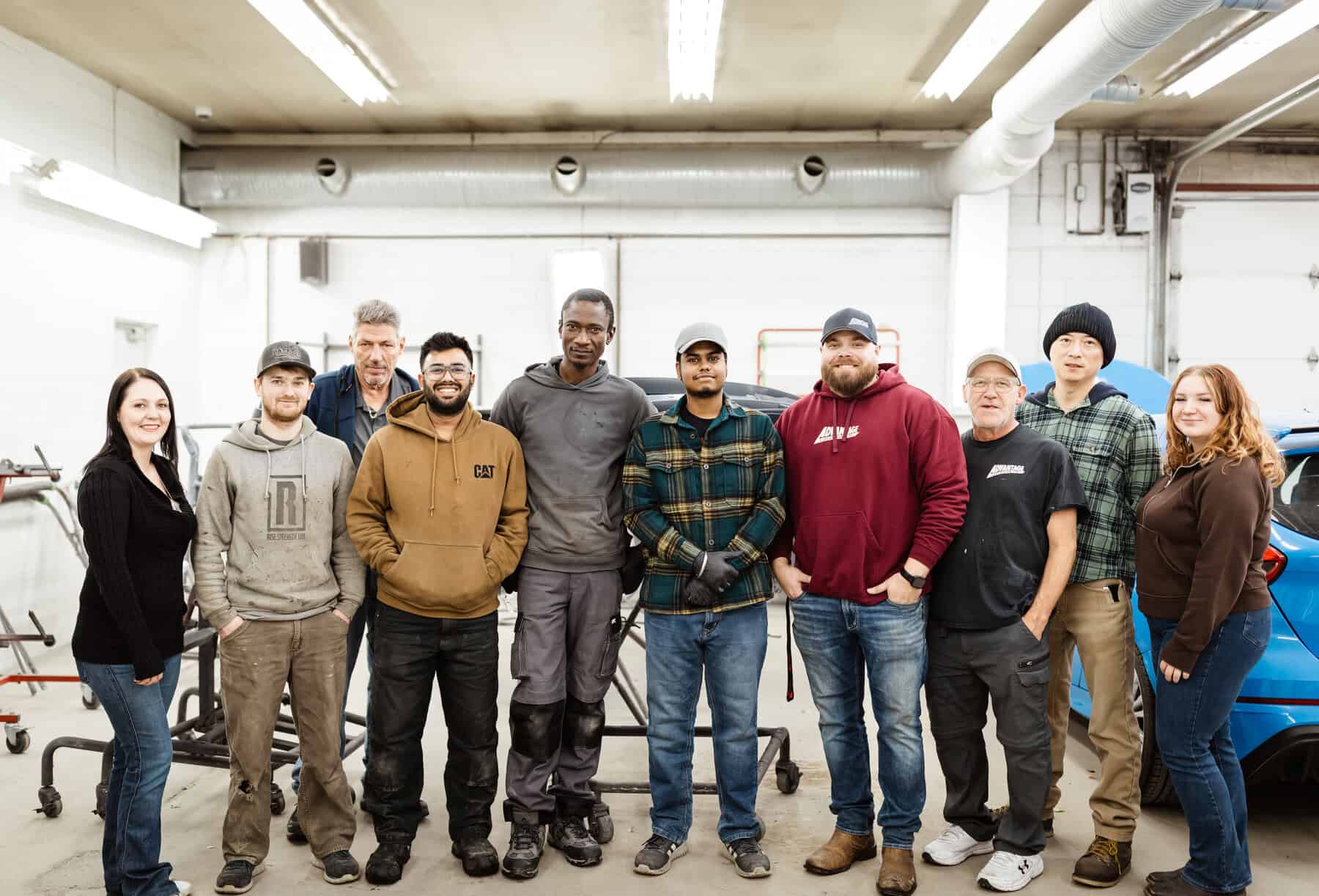 A group of people standing next to each other.