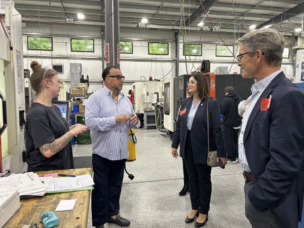 CDC New England and New Haven Bank visiting the CAM Group manufacturing floor